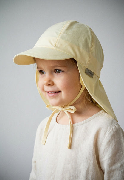 Hat with visor and neckflap