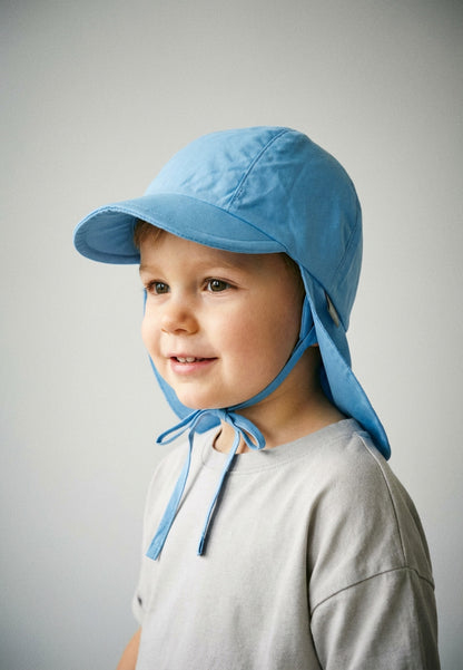 Hat with visor and neckflap