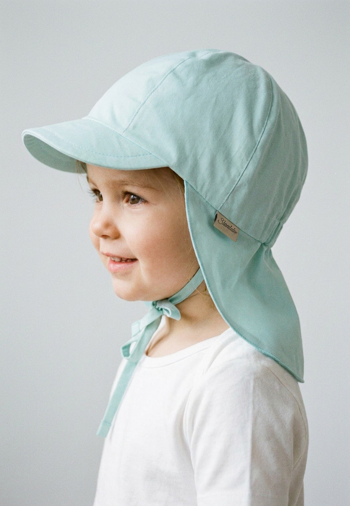 Gorra visera con cubre nuca 