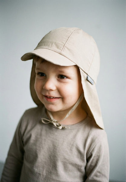 Hat with visor and neckflap