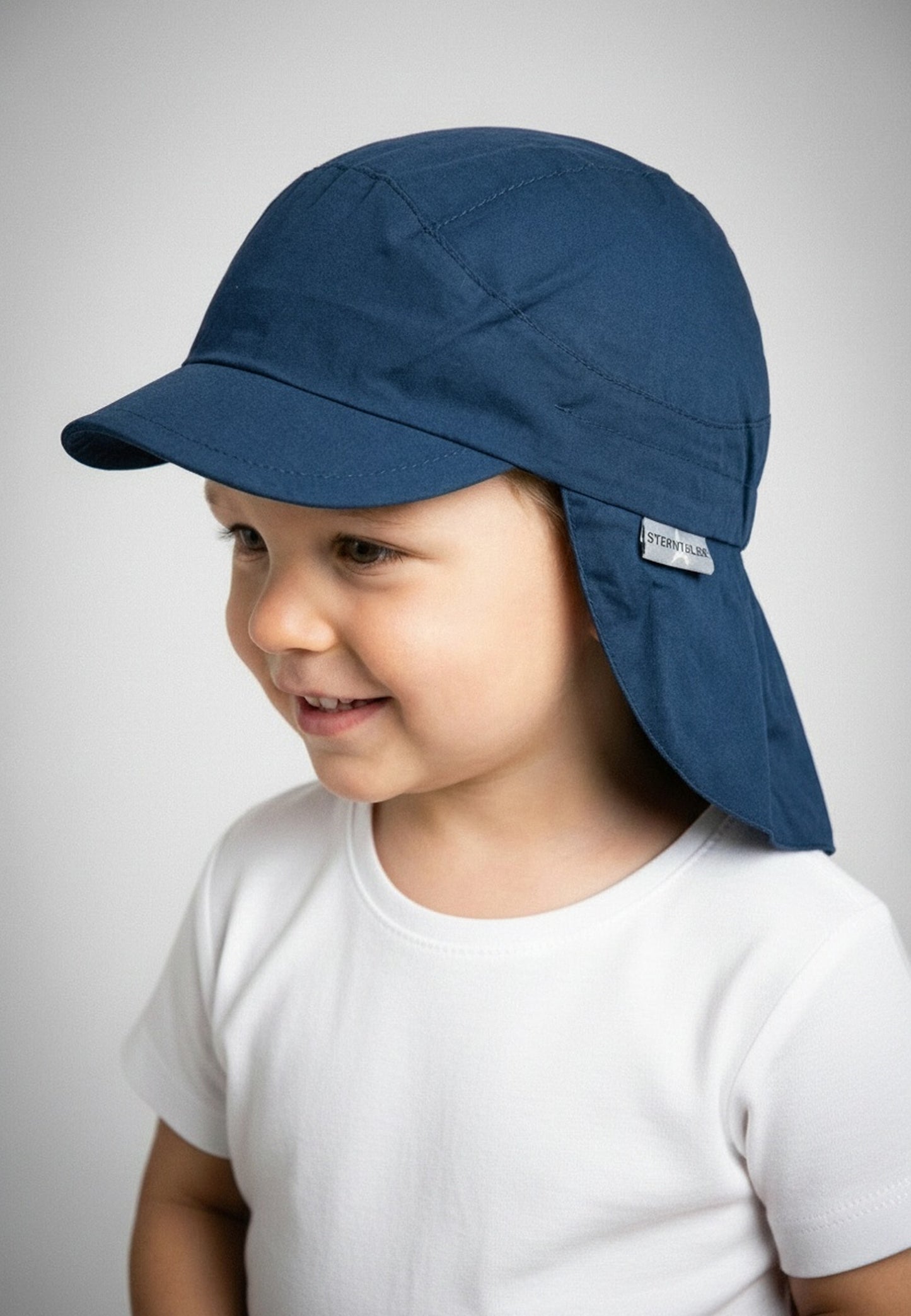 Hat with visor and neckflap
