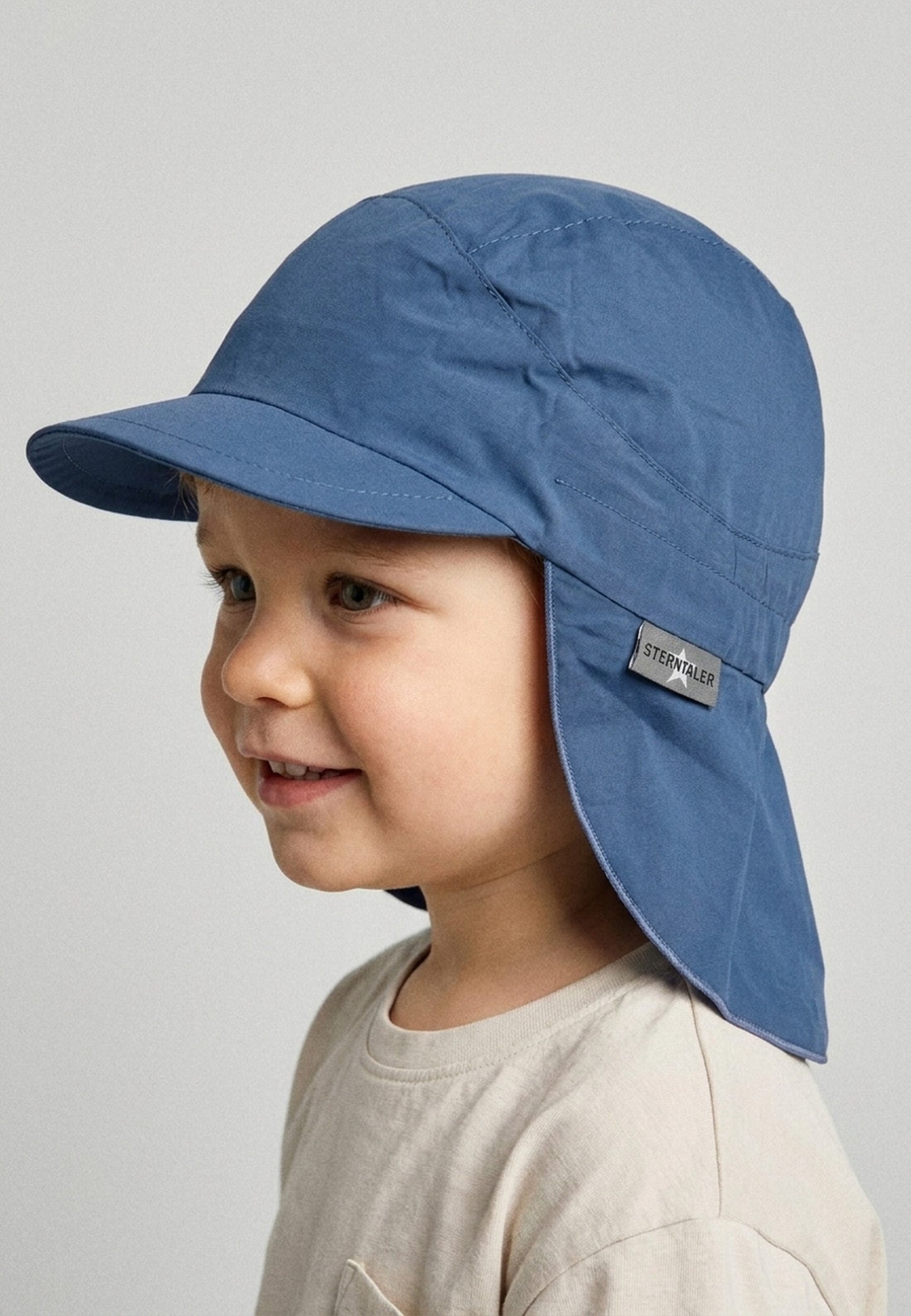 Hat with visor and neckflap