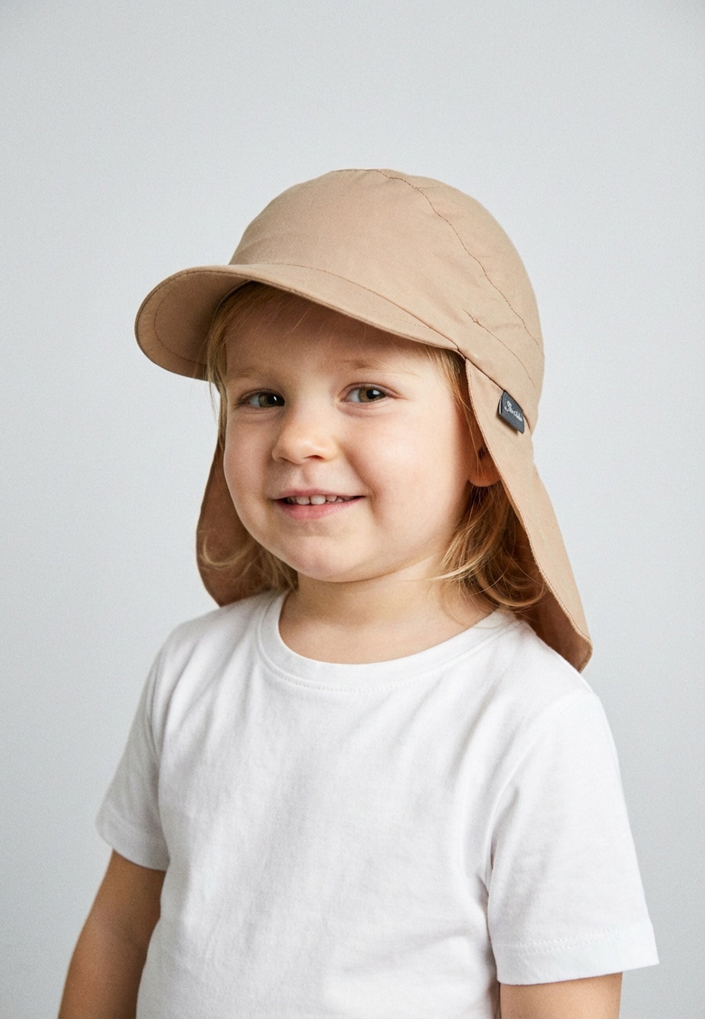 Hat with visor and neckflap