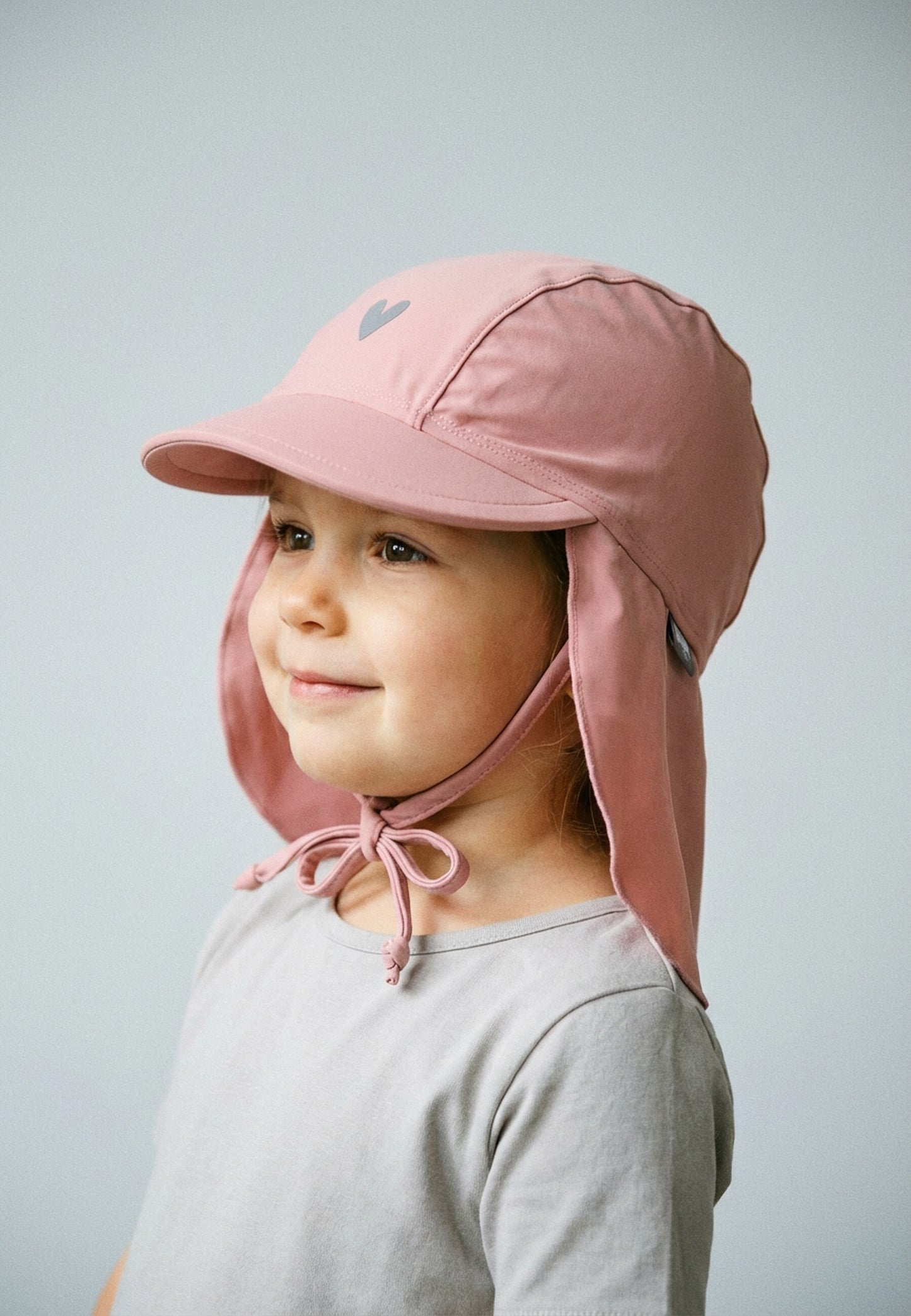 Hat with visor and neckflap